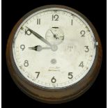 A German Second World War Kriegsmarine Office Clock. Wood frame, the dial measures 7 inches...