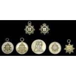 Regimental Prize Medals (7), East Surrey Regiment (7), all silver, one with traces of gildin...