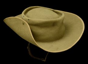 Slouch Hats. A Second War Australian slouch hat, green felt cloth with gilded metal Austral...