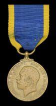 An Edward Medal for Industry awarded to Mr. W. C. Simmons, a Porter with the London and Sout...