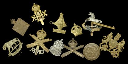 Military Cap Badges. A selection of military cap badges including bronze OSD Machine Gun Co...