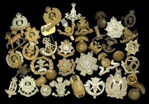 Military Cap Badges. A large selection of military cap badges including Royal West Surrey R...