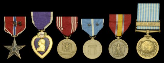 A United States of America 'Korean War' Bronze Star and Purple Heart group of six awarded to...