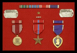 A United States of America Bronze Star and Purple Heart group of three awarded to Private Fi...