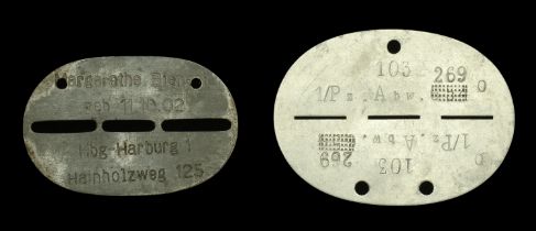 German Second World War Panzer and NS Fraunschaft Identity Tags. A one-piece aluminium spli...