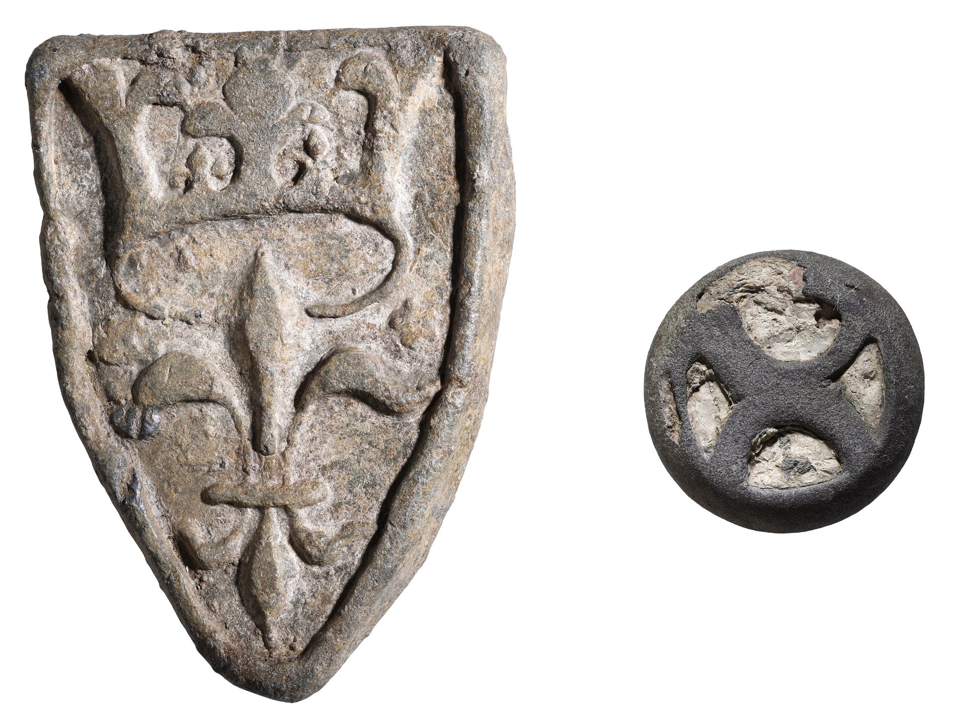 14th century, lead shield-shaped trade weight, crowned fleur-de-lis with a raised border, 67...