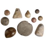 Middle East, 8th-1st century BC, limestone weights or amulets (10), dome-shaped with a flat...