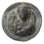 Roman, circular bronze plaquette, 1st-2nd century, 3.8cm diameter, moulded with a draped fem...