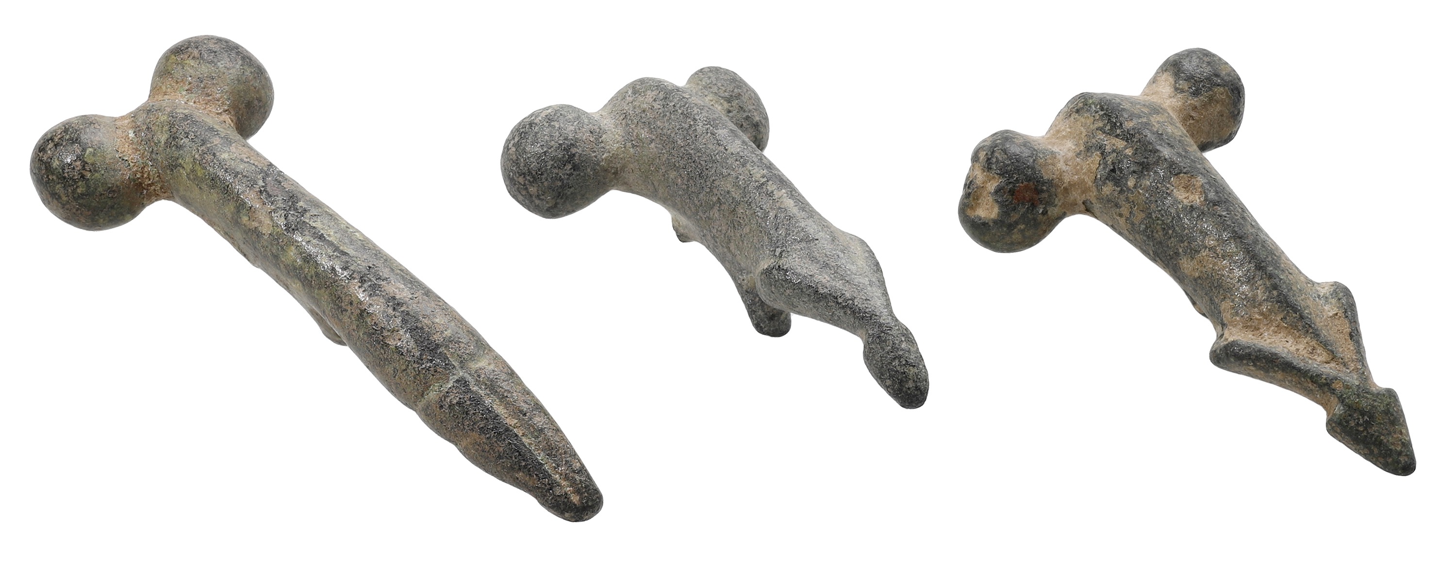 Roman, bronze phallic pendants (3), 2nd century AD, all moulded in the round with a slightly...