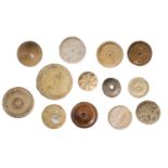 Judaea / Roman, bone spindle whorls, gaming pieces (13), including dome shape with a flat ba...