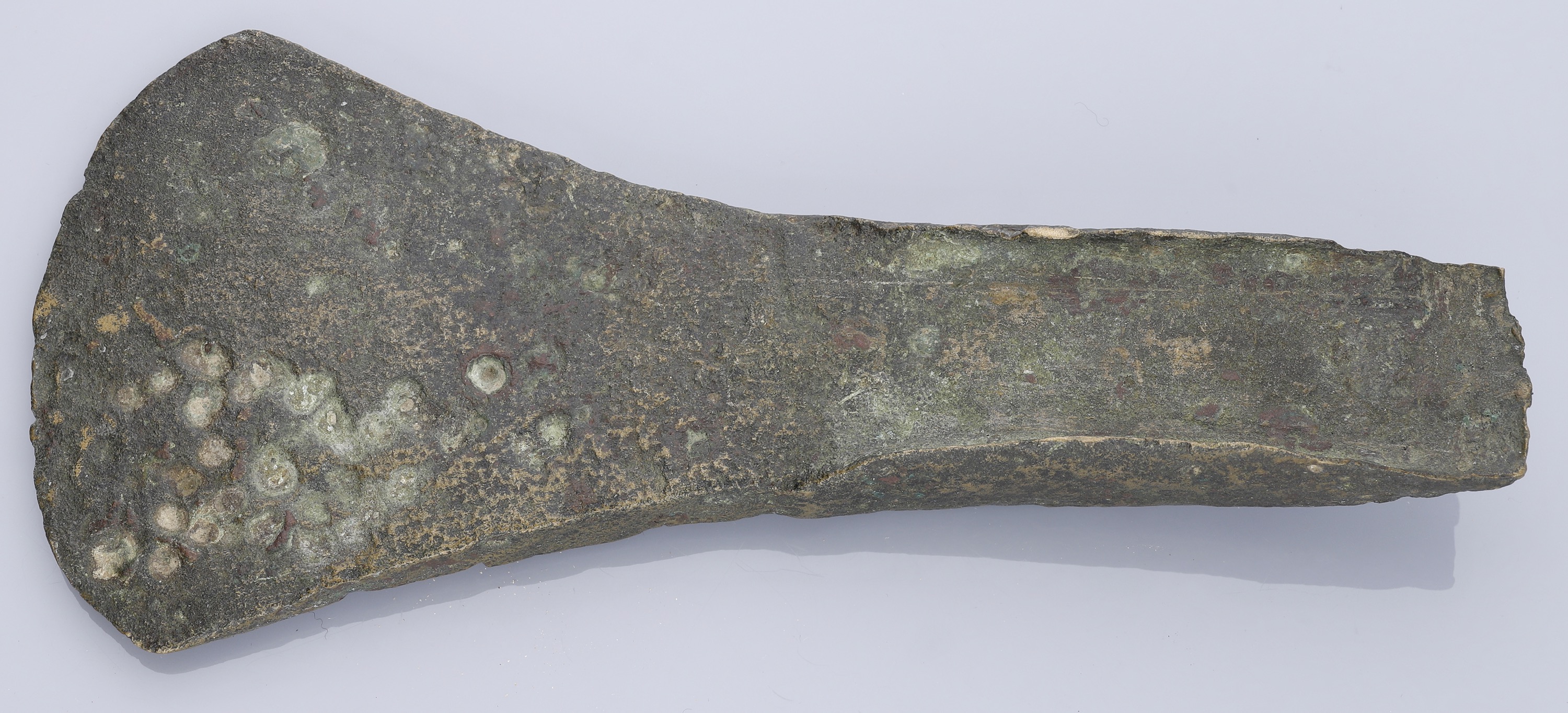 Bronze Age, a flat axe with side flanges, c. 1800-1500 BC, 15.5cm long by 7cm wide by 2cm de... - Image 2 of 2