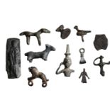 Near East / Persia, bronze artefacts (11), including Urartian seal; Luristan bull; lion lock...