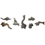 Roman, bronze zoomorphic mounts (7), 1st-3rd century, including dolphins (4), all with studs...