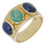 An emerald and sapphire ring, the polished band set with an emerald cabochon with a sapphire...