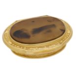 A gold and hardstone snuff box, probably English, circa 1720/30, of shaped oval form, the hi...