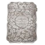 A Victoria silver visiting card case, engraved with formal scrolling foliage and with presen...
