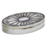 A French early 20th century silver gilt oval box, the hinged lid with central vacant reserve...