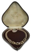 A late 19th century sapphire and pearl curb-link bracelet, the gold bracelet of graduated cu...