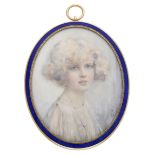An early 20th century oval glazed portrait miniature, depicting a bust length portrait of a...