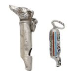 Two silver miniature whistles, the first modelled with a dog's head terminal, with ring susp...