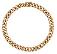 A gold curb-link chain bracelet, the clasp stamped '18K' and '750', length approximately 21c...