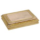 An early 20th century two-colour gold box, the hinged cover and base with engine-turned pane...