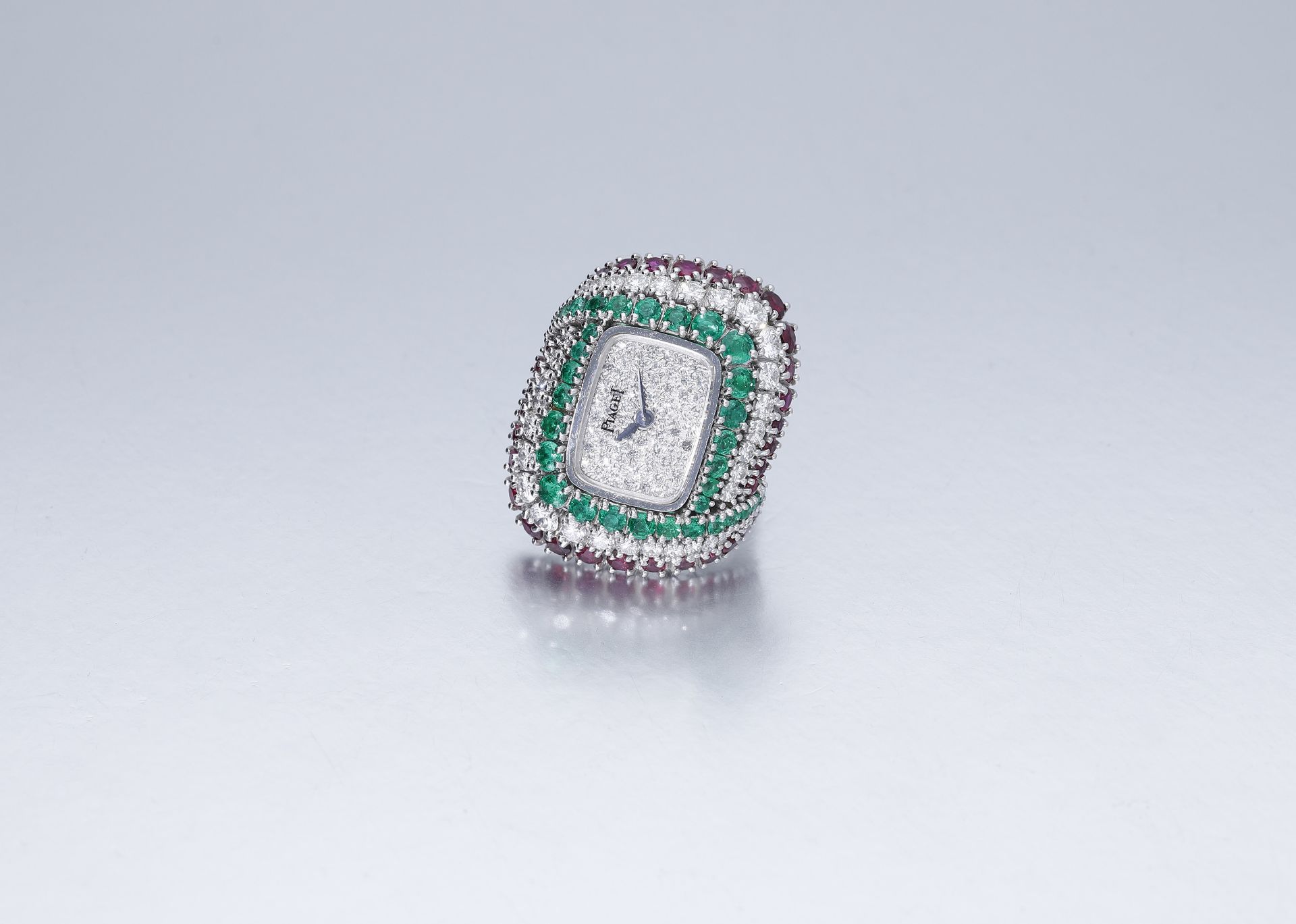 Piaget. A lady's white gold, emerald, ruby and diamond-set ring watch, ref. 3657, circa 1976... - Bild 2 aus 10