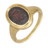 A 19th century hardstone intaglio ring, the oval agate plaque carved to depict an erotic sce...