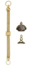 Two fob seals and a gilt chain fob, comprising a gilt metal mounted Wedgwood & Bentley black...