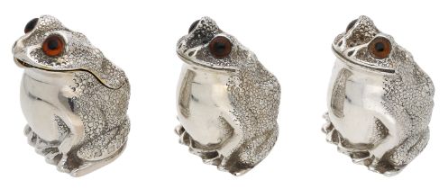 A silver frog condiment set, with realistically modelled bodies and glass bead eyes, the mus...