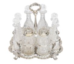 A Victoria silver cruet stand, the octofoil base with border of alternating floret and geome...