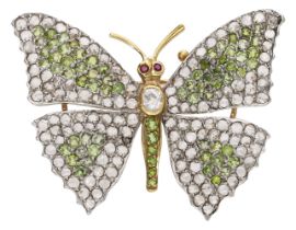 A gem-set butterfly brooch, the wings set throughout with circular-cut demantoid garnets and...