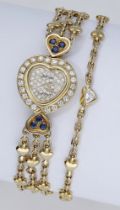 Chaumet/Delaneau. A lady's gold, diamond and sapphire-set heart-shaped bracelet watch, Ref....