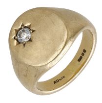 A 9ct gold and diamond set signet ring, the oval-shaped bezel set with a brilliant-cut diamo...