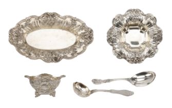 An American silver bread dish and matching sweetmeat dish, both repoussÃ© decorated with frui...