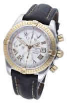 Breitling. A stainless steel and gold automatic chronograph wristwatch, Ref. C13356, Chronom...