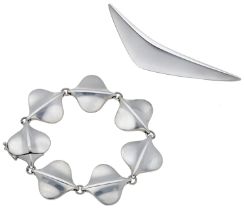 A Danish silver bracelet by Georg Jensen, designed by Annette Howdle, and a 'Boomerang' broo...