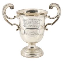A George V silver trophy cup, with 'C'-scroll handle and girdled body, the Glendale Sports C...