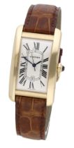 Cartier. A gold automatic rectangular wristwatch with date, Ref. 1740, Tank AmÃ©ricaine, circ...