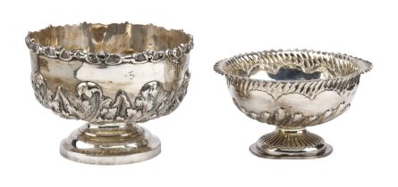 Two Victoria silver footed sugar bowls, one repoussÃ© decorated with wrythen leaves and with...