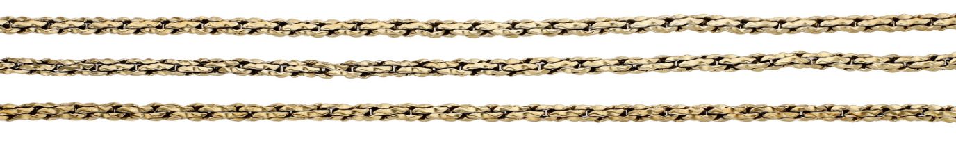 A fancy-link longchain, of woven design, stamped '585', length 87.5cm. Â£1,200-Â£1,500