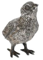 A silver cast model of snow goose gosling, realistically modelled, signed beneath a wing 'SN...