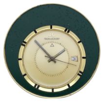 Jaeger-LeCoultre. A gilt-metal travel timpiece with alarm, circa 1960. Movement: manual win...