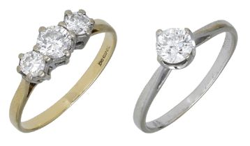 Two diamond rings, the first set with a brilliant-cut diamond, stamped 'WG 750', the second...