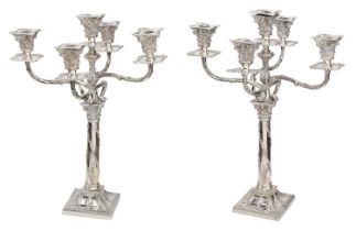 A pair of Victoria silver candelabra, of George III neo-classical design, with corinthian ca...