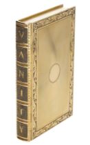 An 18ct gold minaudiÃ¨re by Cartier, 1929, the exterior designed in the form of a book, the c...