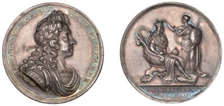 George I, Coronation, 1714, a silver medal by J. Croker, laureate bust right, rev. Britannia...