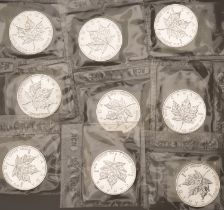 Canada, Elizabeth II, silver Dollars (9), all 2002 [9]. As struck, mint-sealed Â£180-Â£220