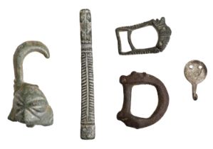 Late Saxon / Norman, assorted artefacts (5), 10th-11th century, including silver garter hook...