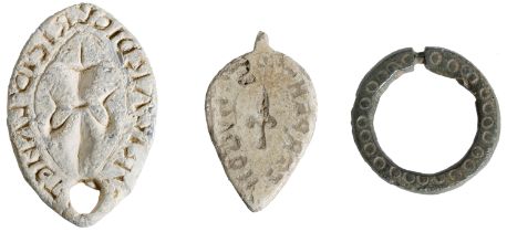 13th century, lead seal matrices (2), pointed oval, pierced at top, fleur de lis, reads s' r...